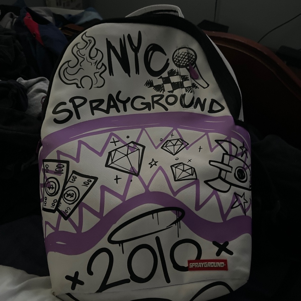 Limited spray ground back pack